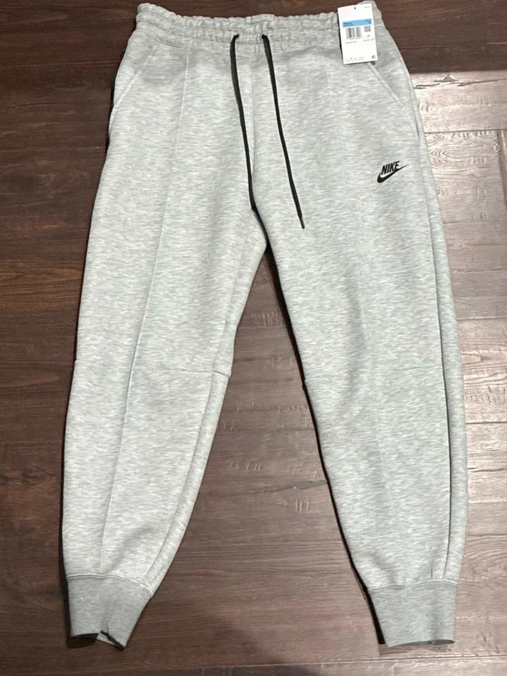 Women’s grey nike tech pants